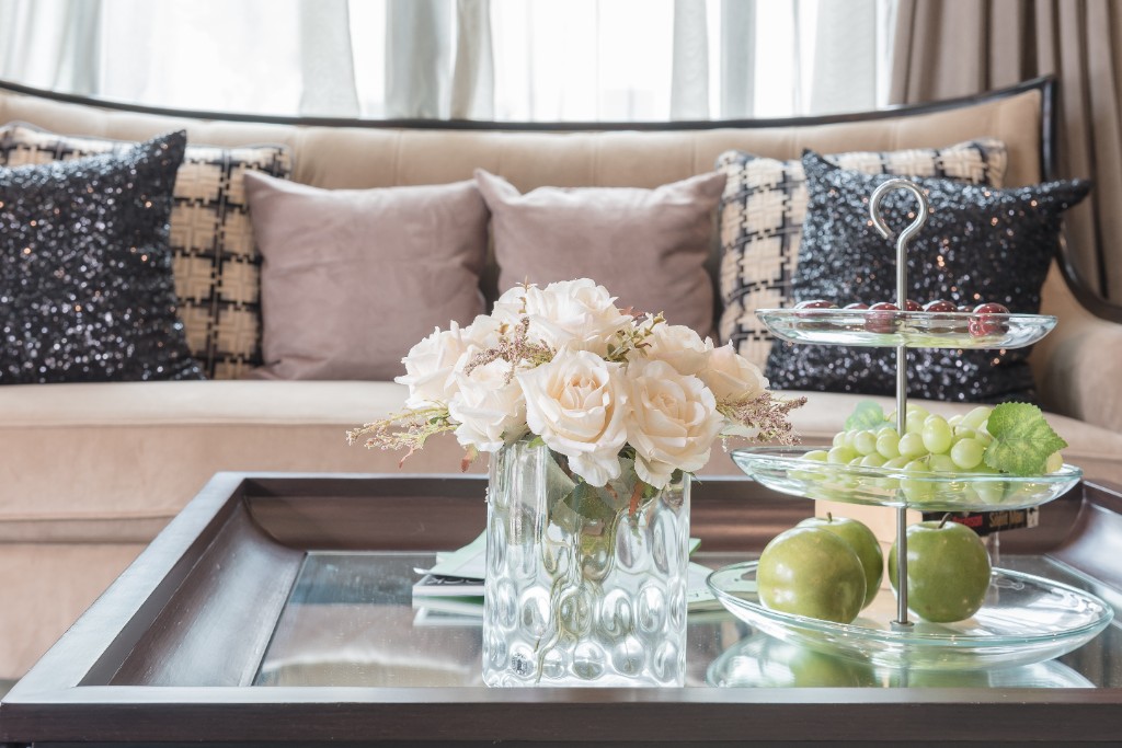 Elegant living room with flowers and fresh fruit